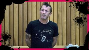 Phil Rudd posando
